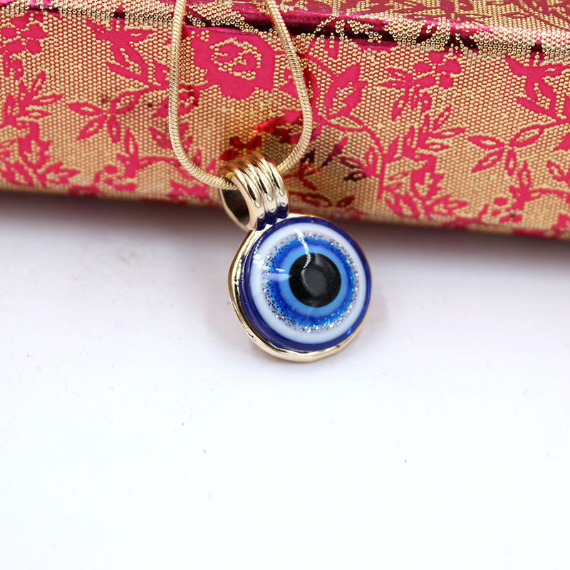 “Blue Evil Eye Necklace – Gold Charm for Protection & Style”