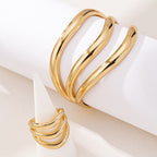 Aurora Glow™ – Luxurious Gold Wave Ring Set