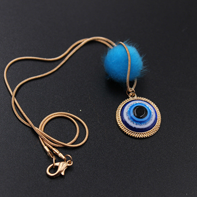 “Blue Evil Eye Necklace – Gold Charm for Protection & Style”