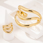 Aurora Glow™ – Luxurious Gold Wave Ring Set