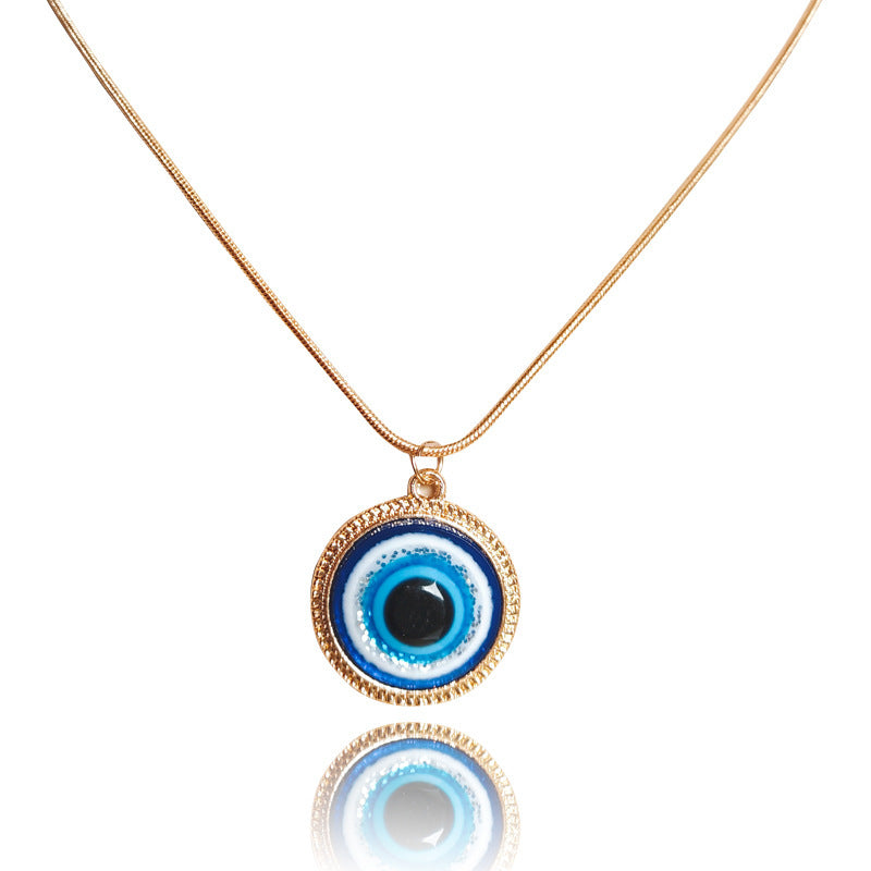 “Blue Evil Eye Necklace – Gold Charm for Protection & Style”