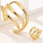 Aurora Glow™ – Luxurious Gold Wave Ring Set