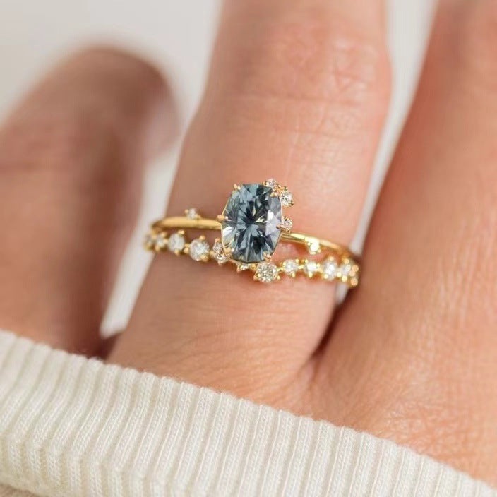 “Luxury Blue Gemstone Gold Ring – Elegant Sparkle Design”